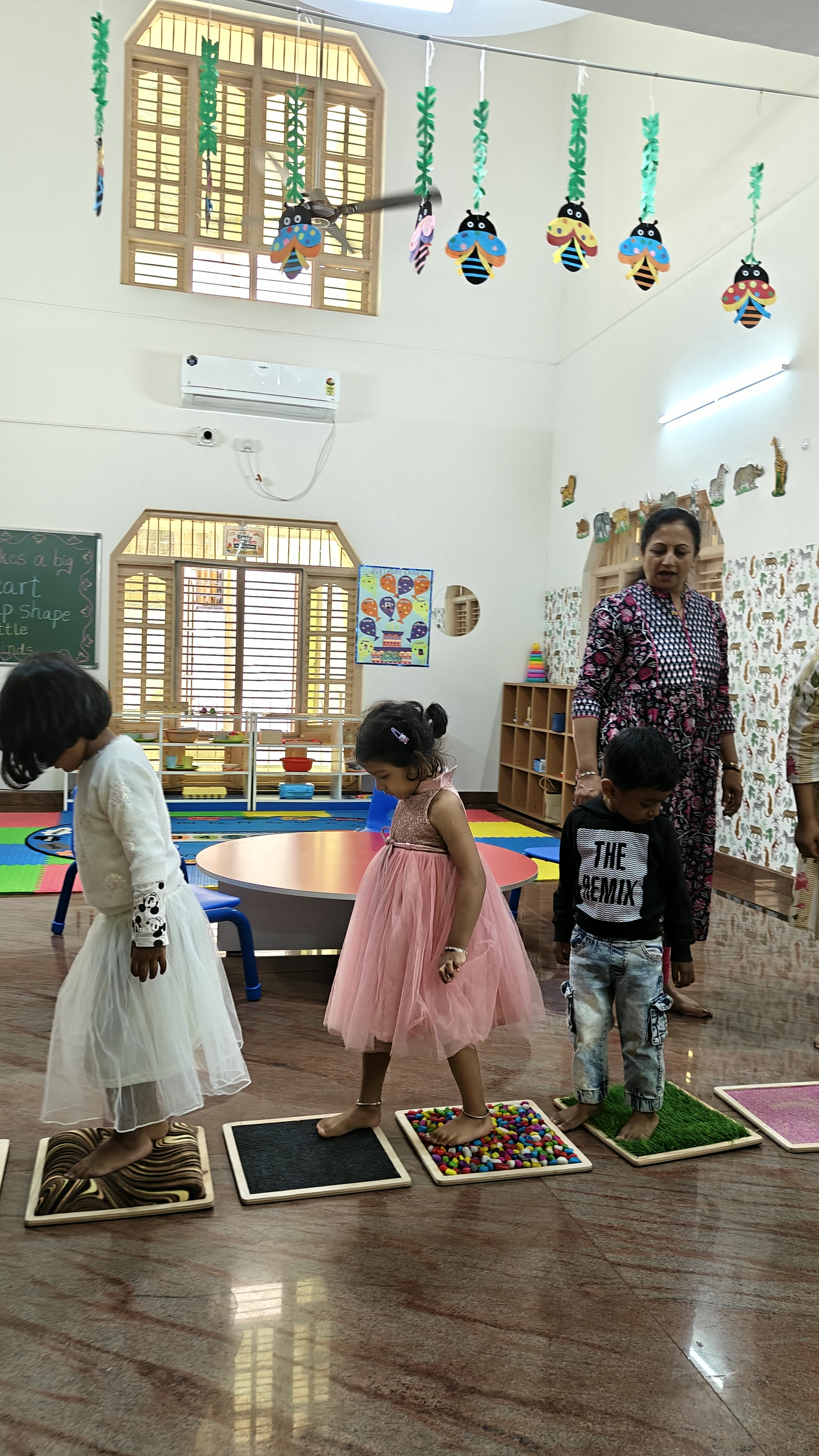 Children exploring a sensory tray together