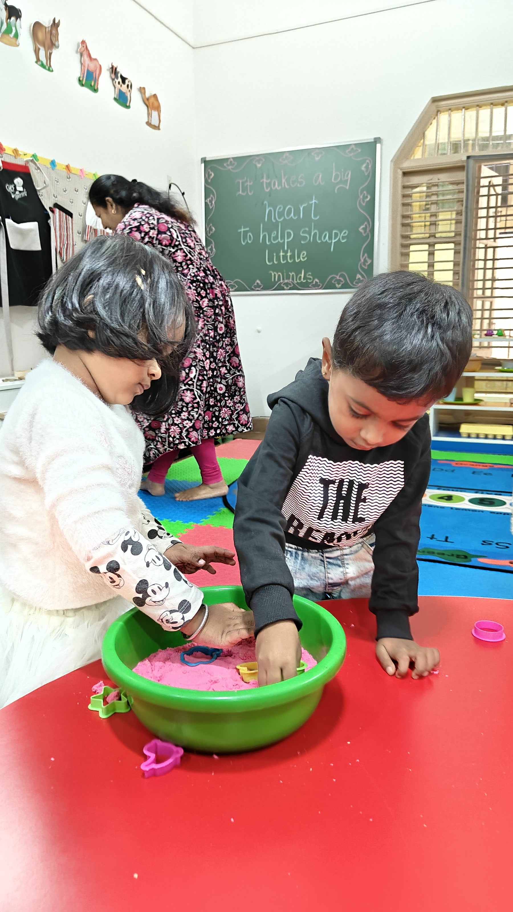 Child choosing a tabletop activity independently